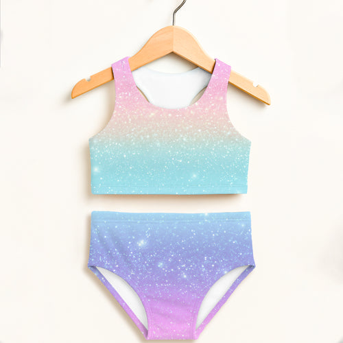 Girls faux sparkle effect rainbow two-piece swimsuit with pastel gradient starry sky on stretchy upf 50+ fabric