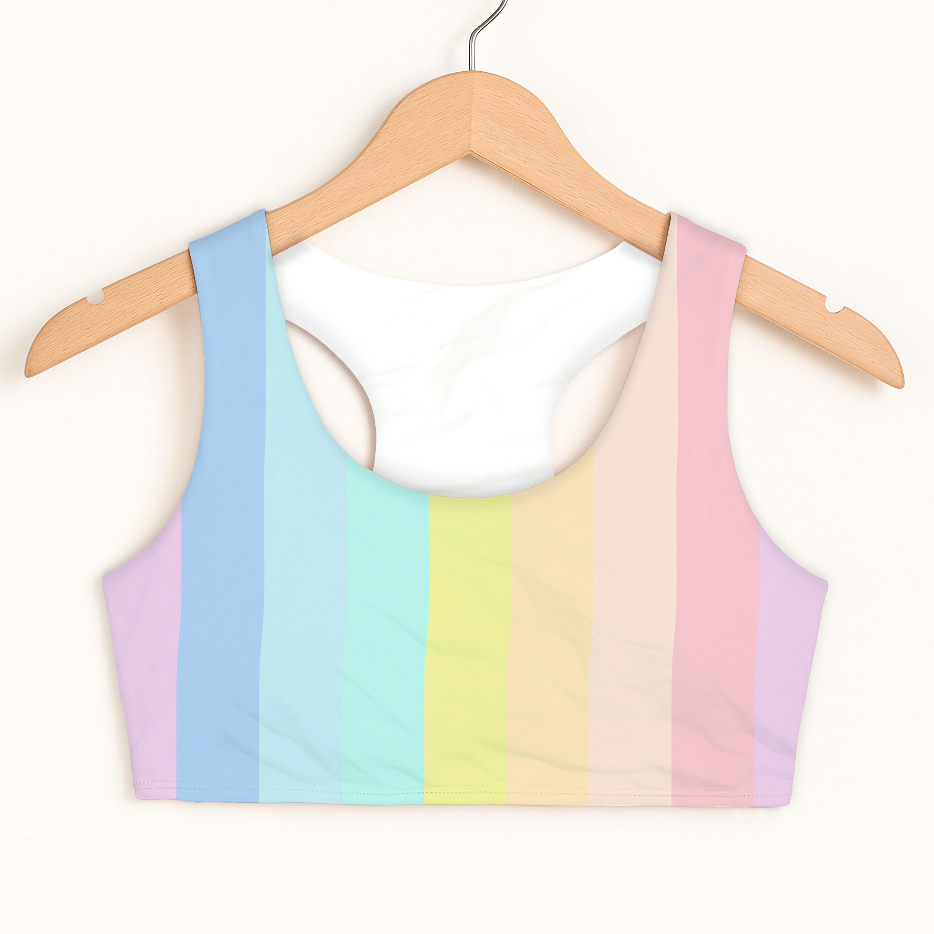 Girls pastel rainbow striped sports bra with quick drying double layered fabric for comfortable activewear