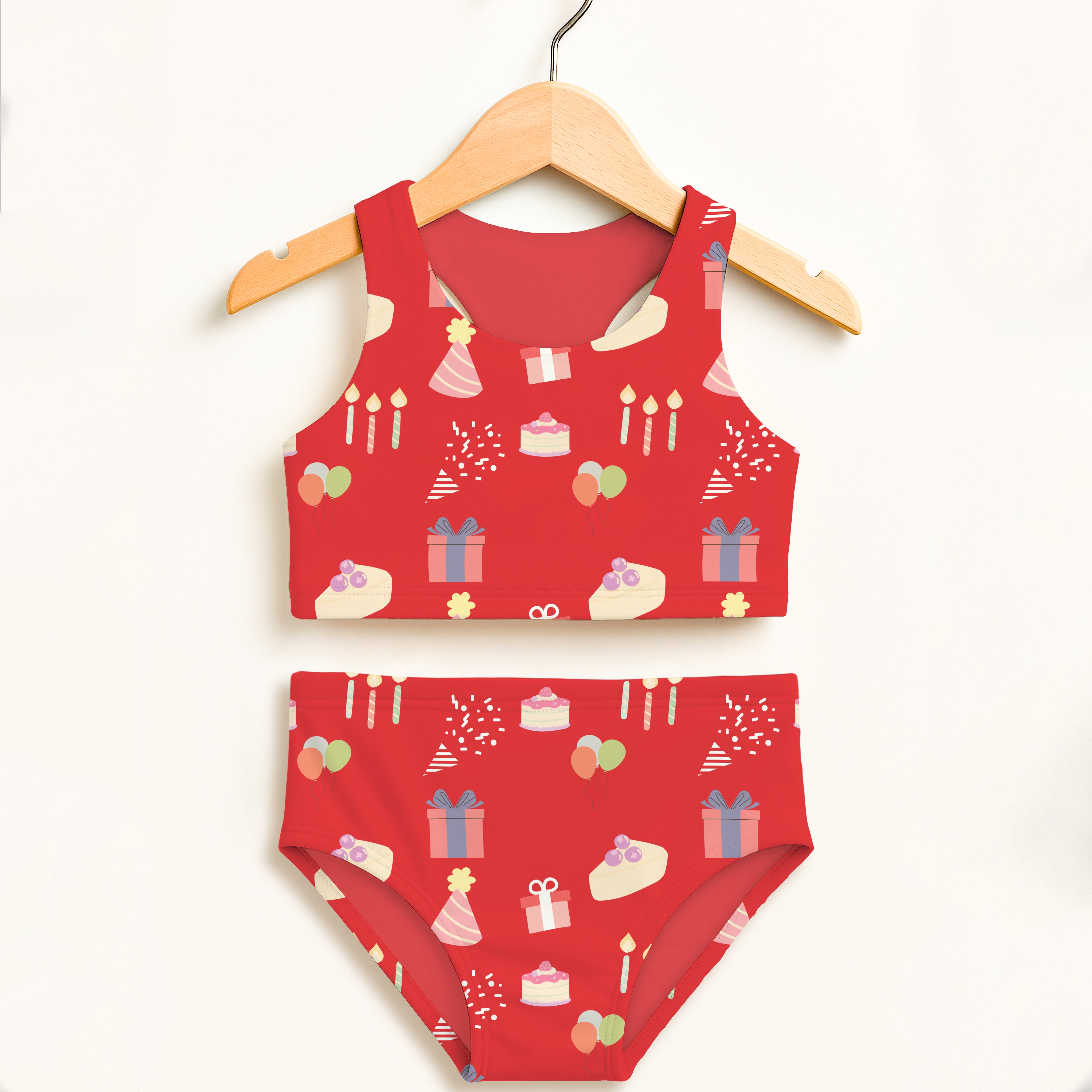 Girls red birthday party two piece swimsuit with playful cake and gift illustrations double layered upf 50+ high waisted
