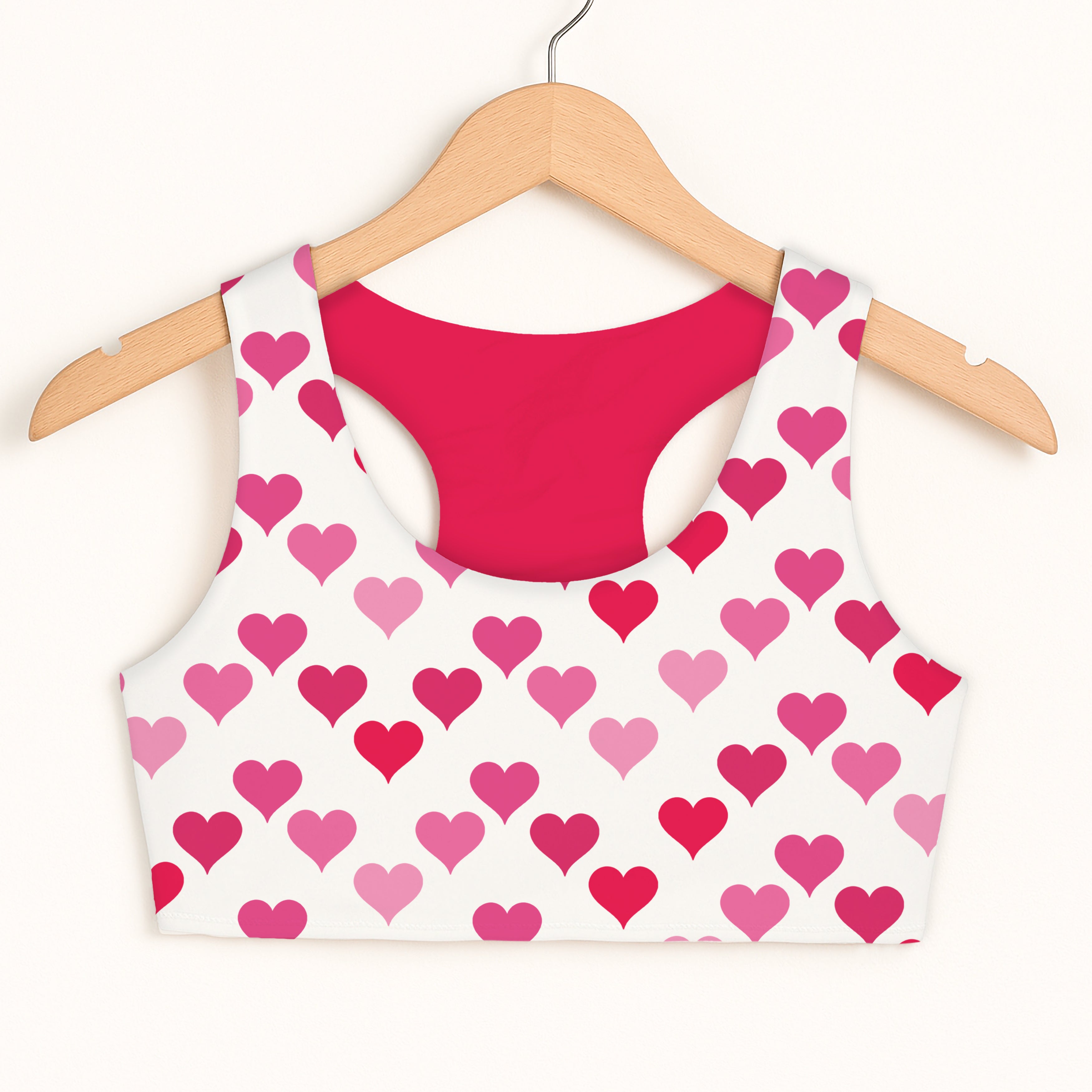 Girls pink and red heart sports bra with vibrant pattern double layered comfort and quick drying fabric