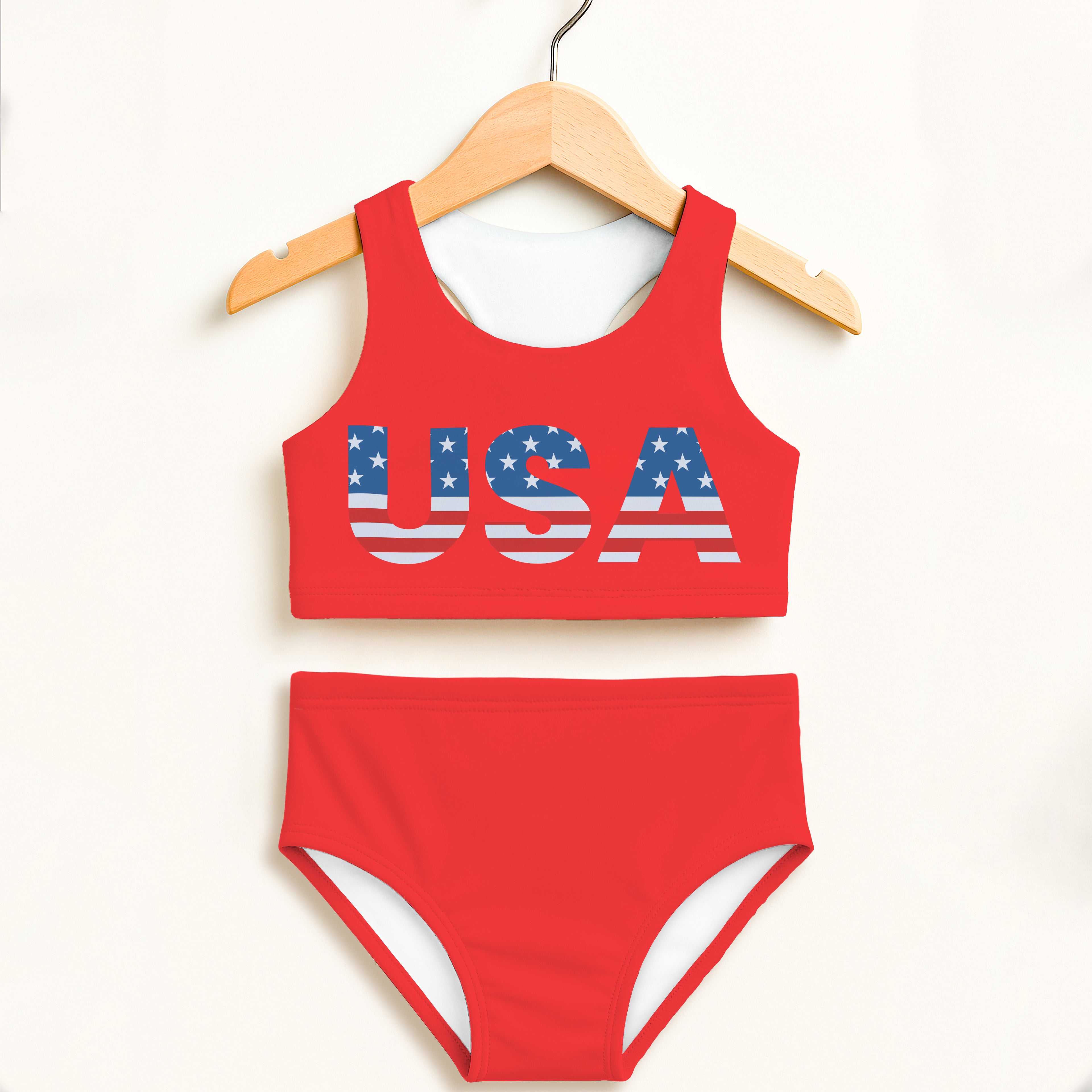 Girls usa two piece swimsuit in red with american flag usa print white side trim and double layered upf 50 plus fabric