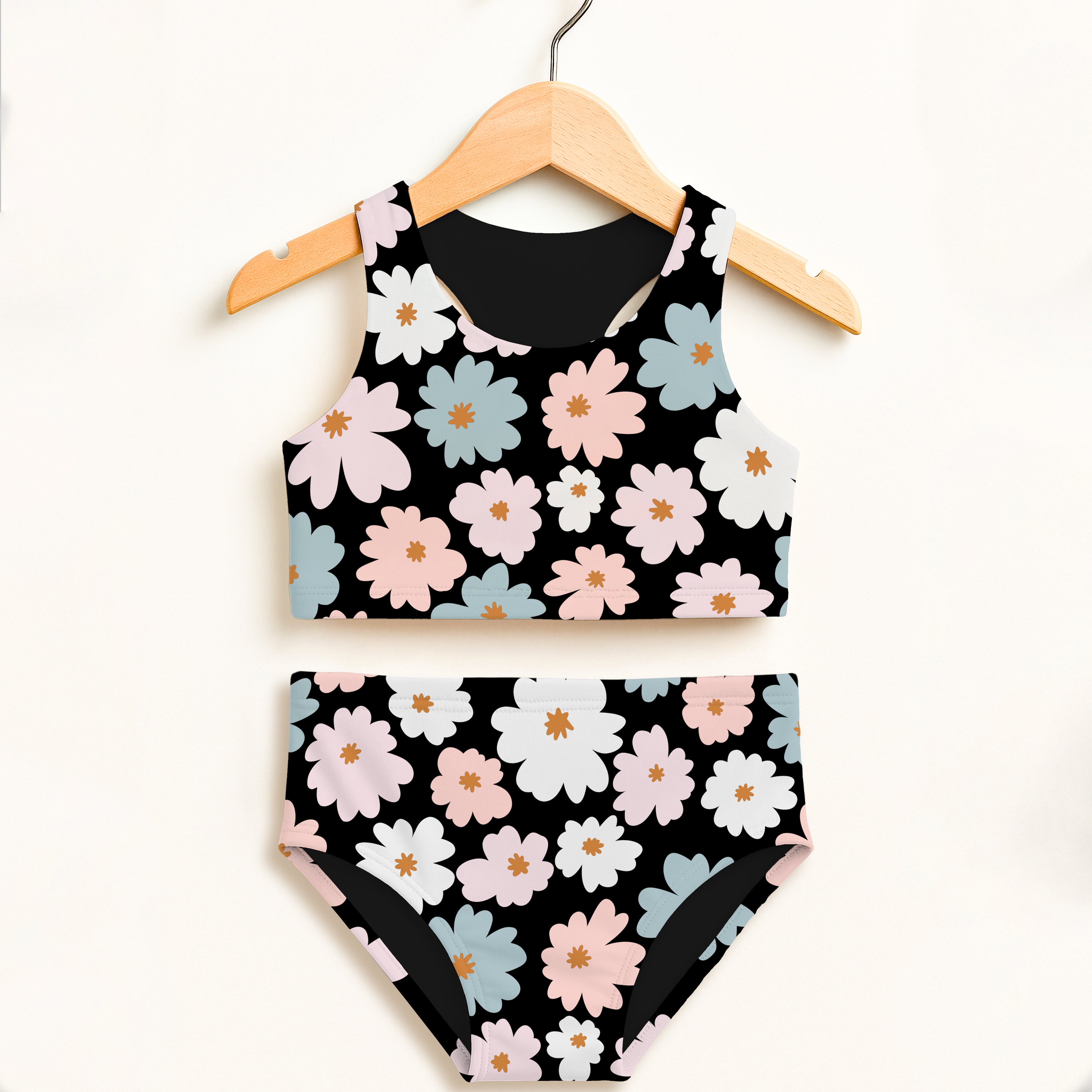 Black floral two-piece swimsuit with pink white and light blue daisies for girls retro purple high waisted comfort