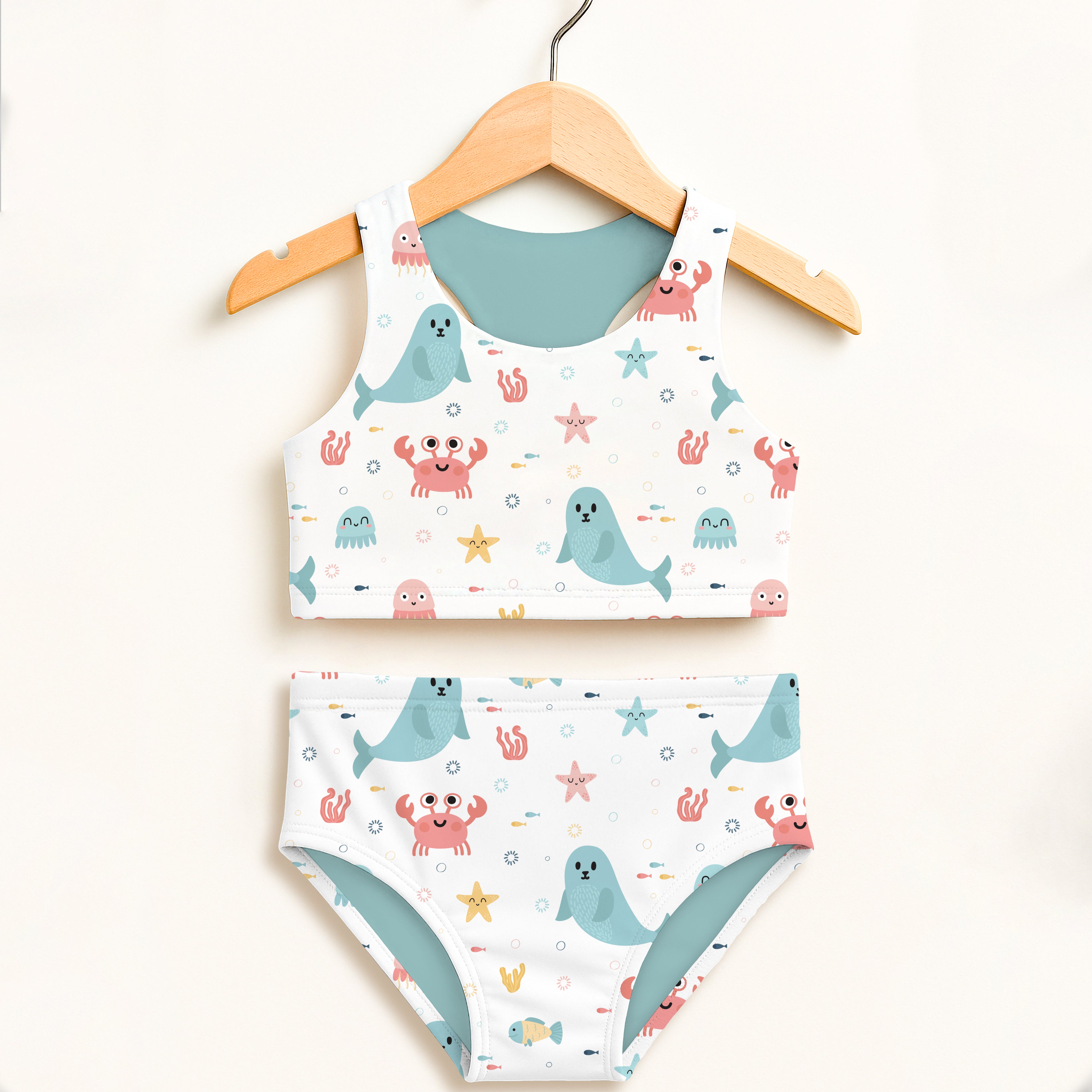 White and teal girls sea animal two piece swimsuit with cartoon seals crabs starfish octopuses double layered upf 50+