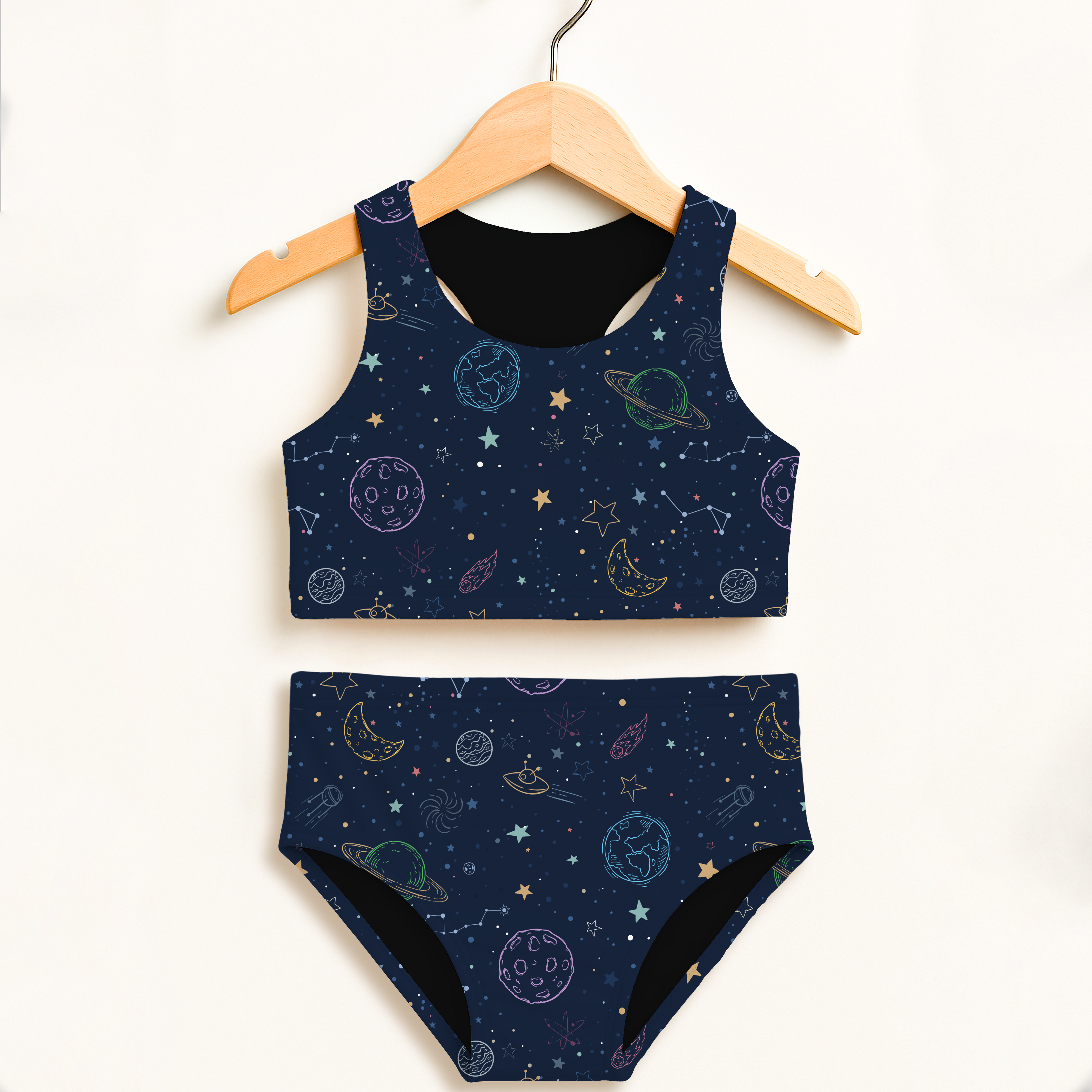 Girls colorful galaxy space two piece swimsuit in navy blue with pastel celestial outlines and double layered upf 50 high waisted comfort