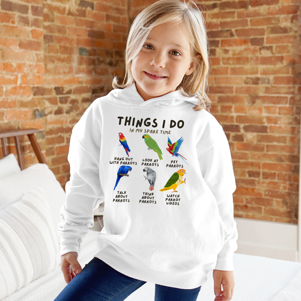 Kids white hoodie with colorful parrot illustrations and text things i do in my spare time on front