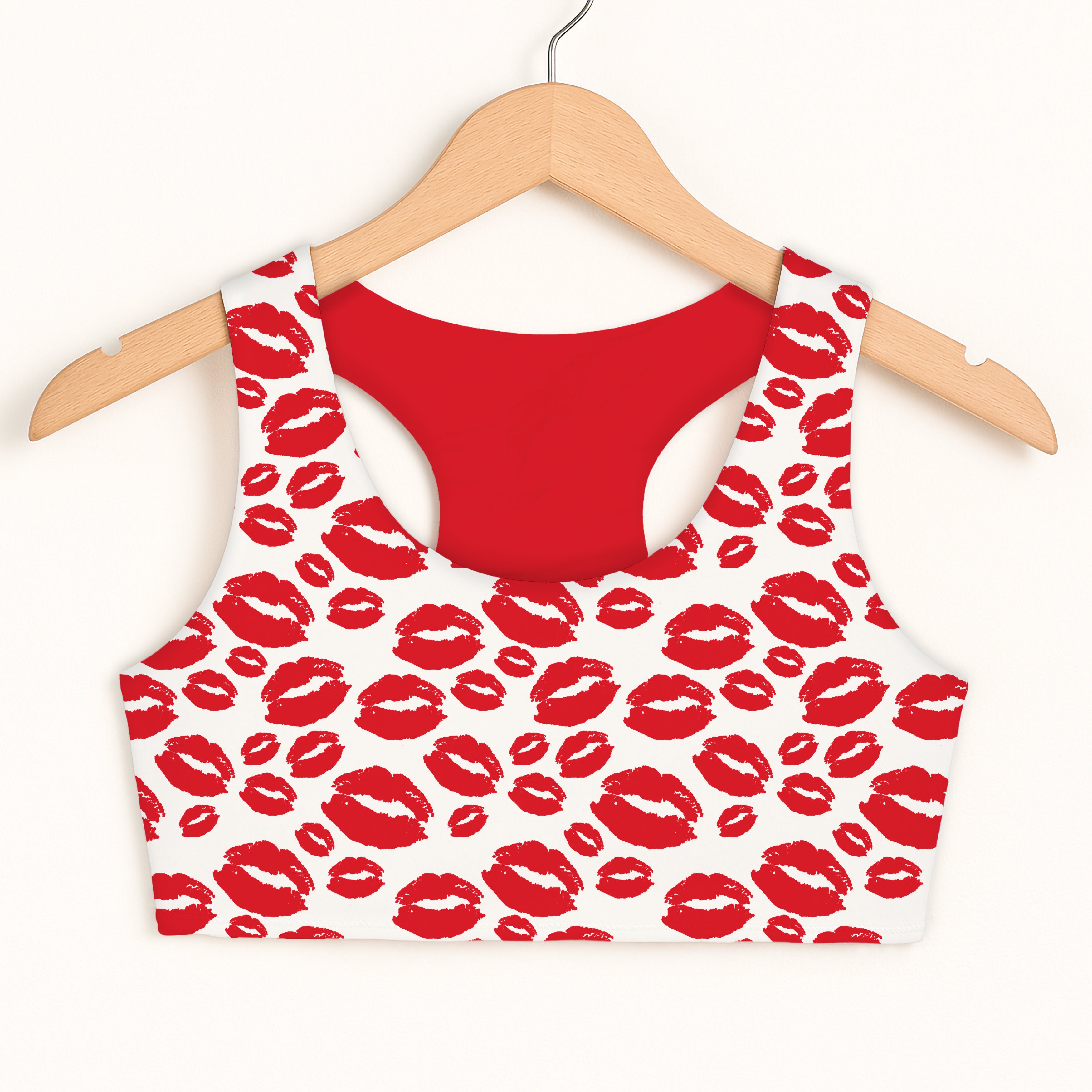 Girls valentines day kiss print sports bra with red and white lip prints and solid red quick drying double layered lining