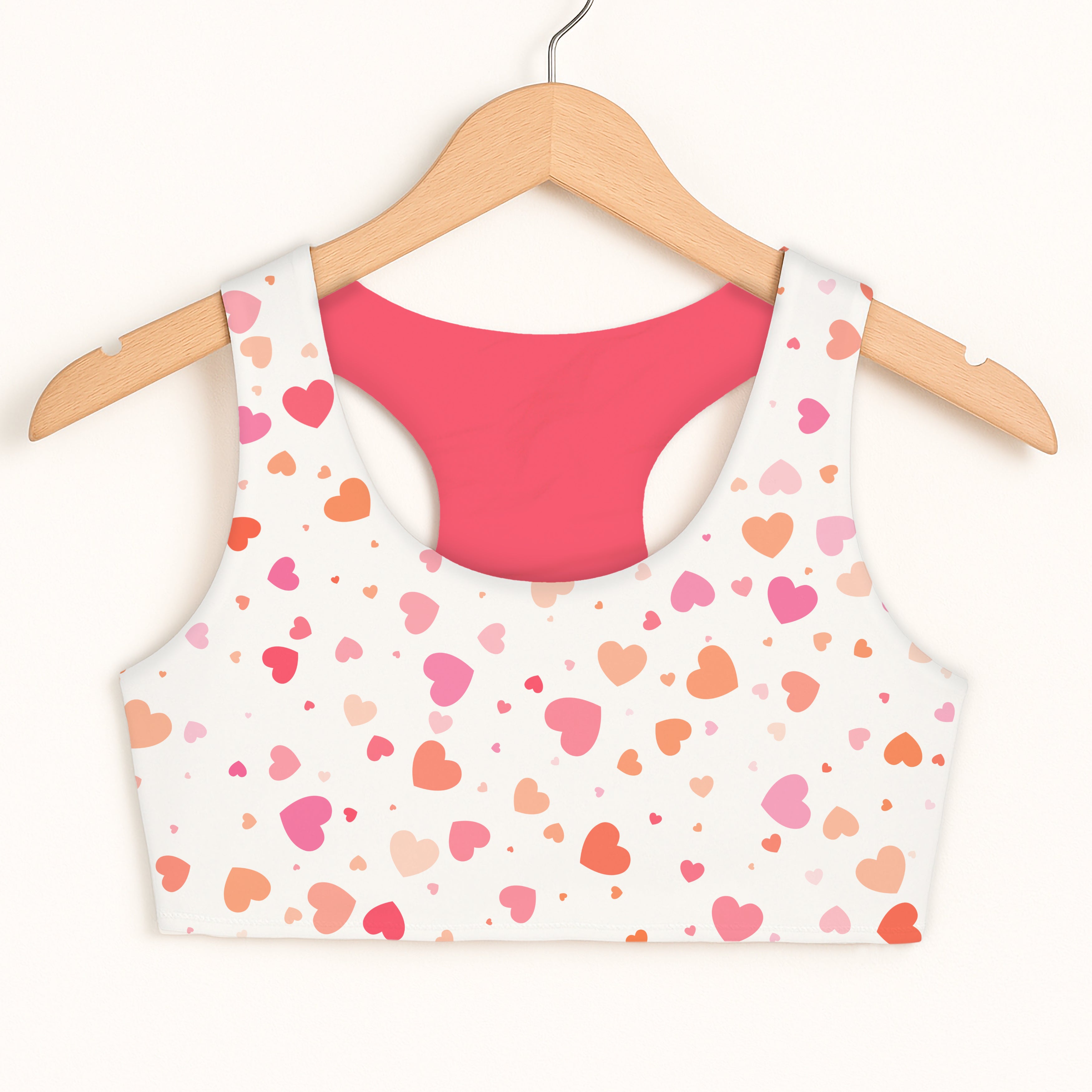 Girls pastel heart sports bra in white with pink interior and heart pattern features quick drying and double layered comfort