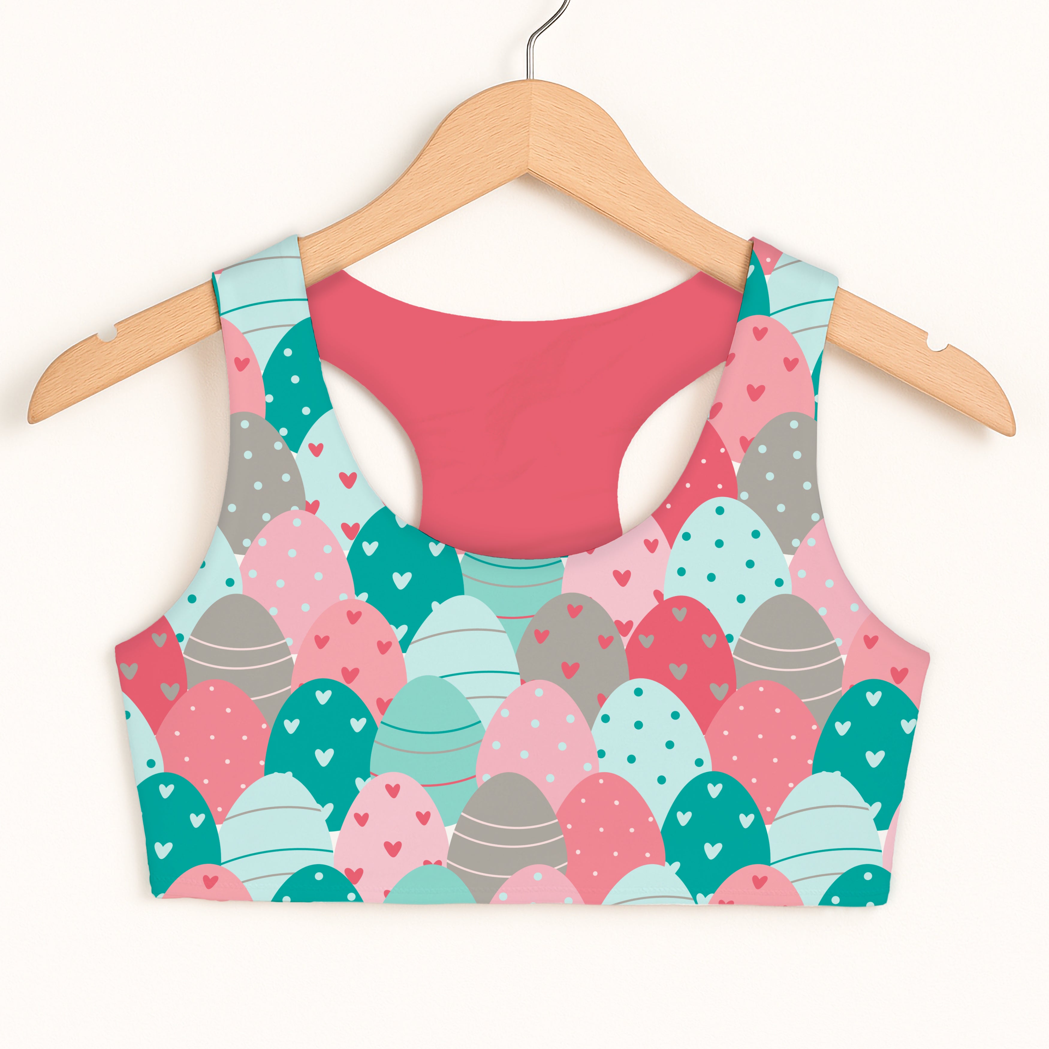 Girls stacked easter eggs sports bra with pastel crop top design featuring quick drying double layered comfort