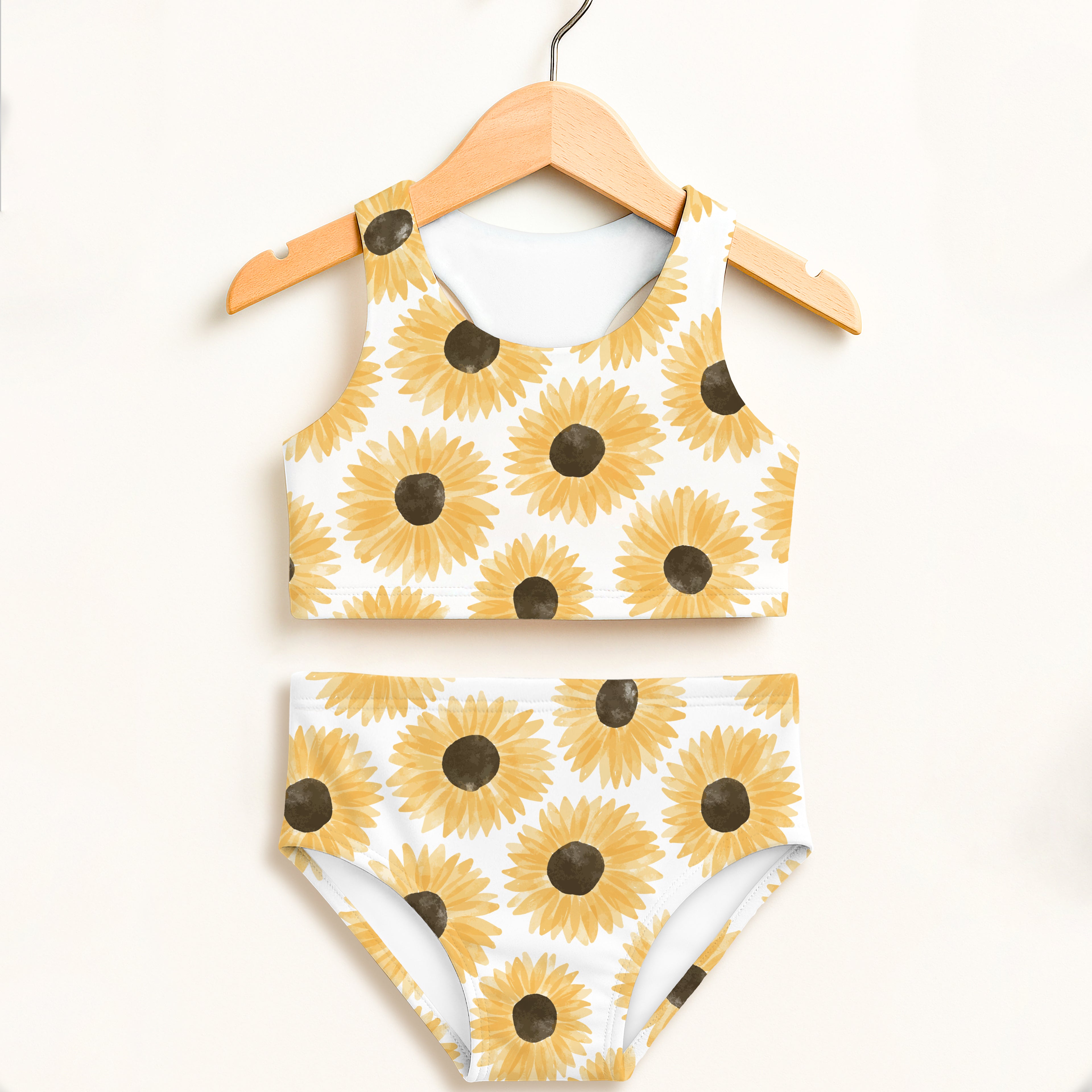 Girls sunflower two piece swimsuit with white sunflower pattern yellow petals dark brown centers upf 50+ high waisted