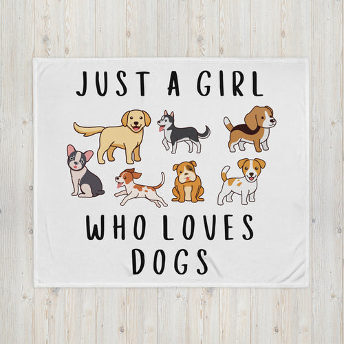 White throw blanket with cartoon dog breeds and black text just a girl who loves dogs for girls