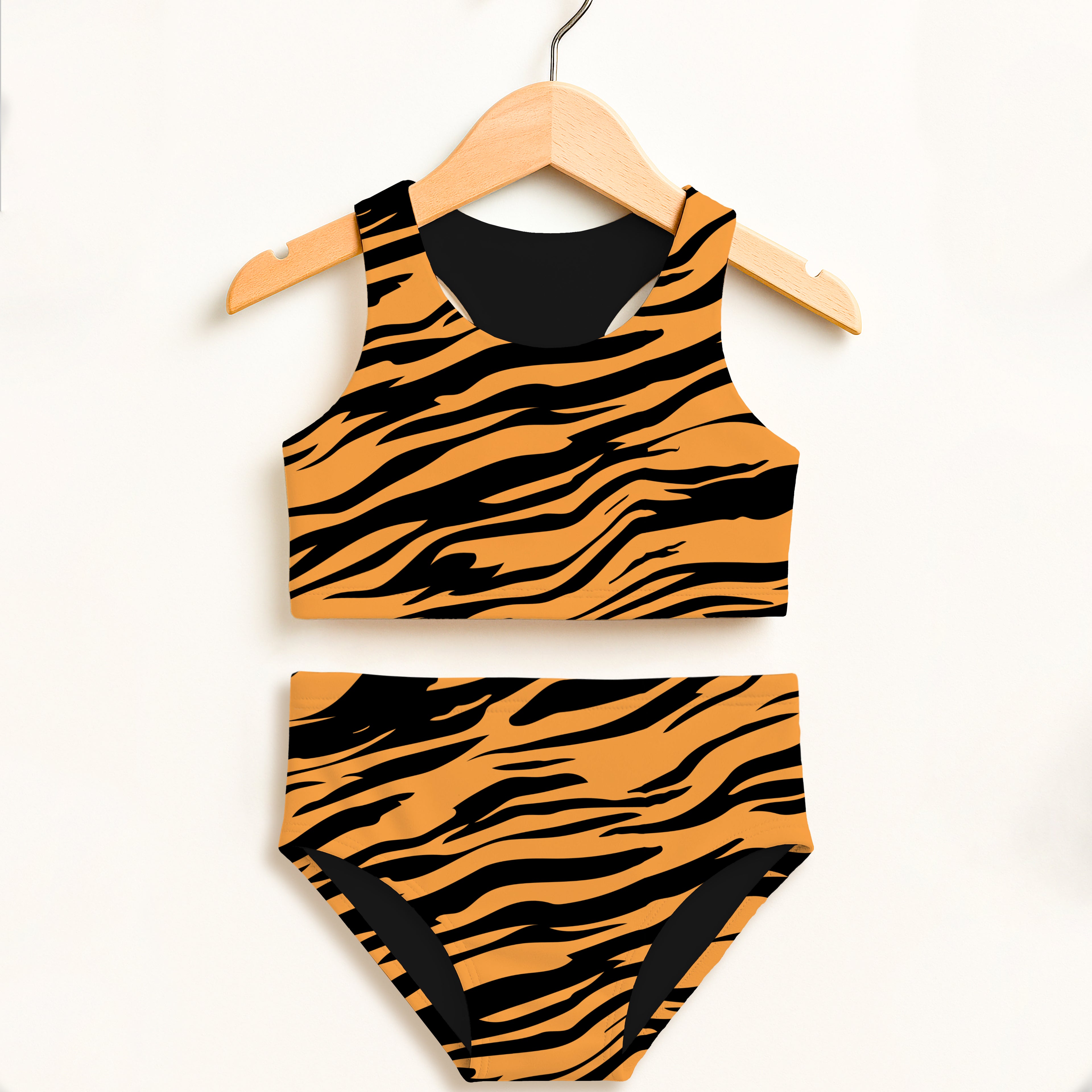 Girls tiger stripe two piece swimsuit with orange and black pattern featuring halter top and high waisted bottoms