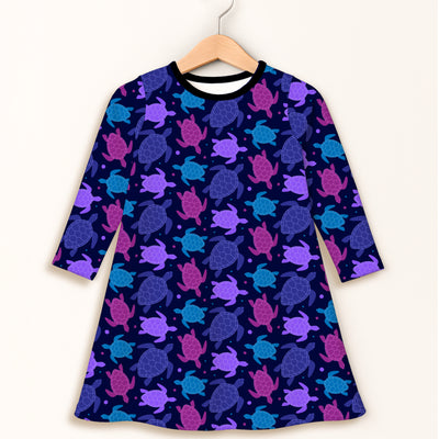 Girls purple sea turtle long sleeve navy blue dress with black ribbed neckline and vibrant sea turtle pattern
