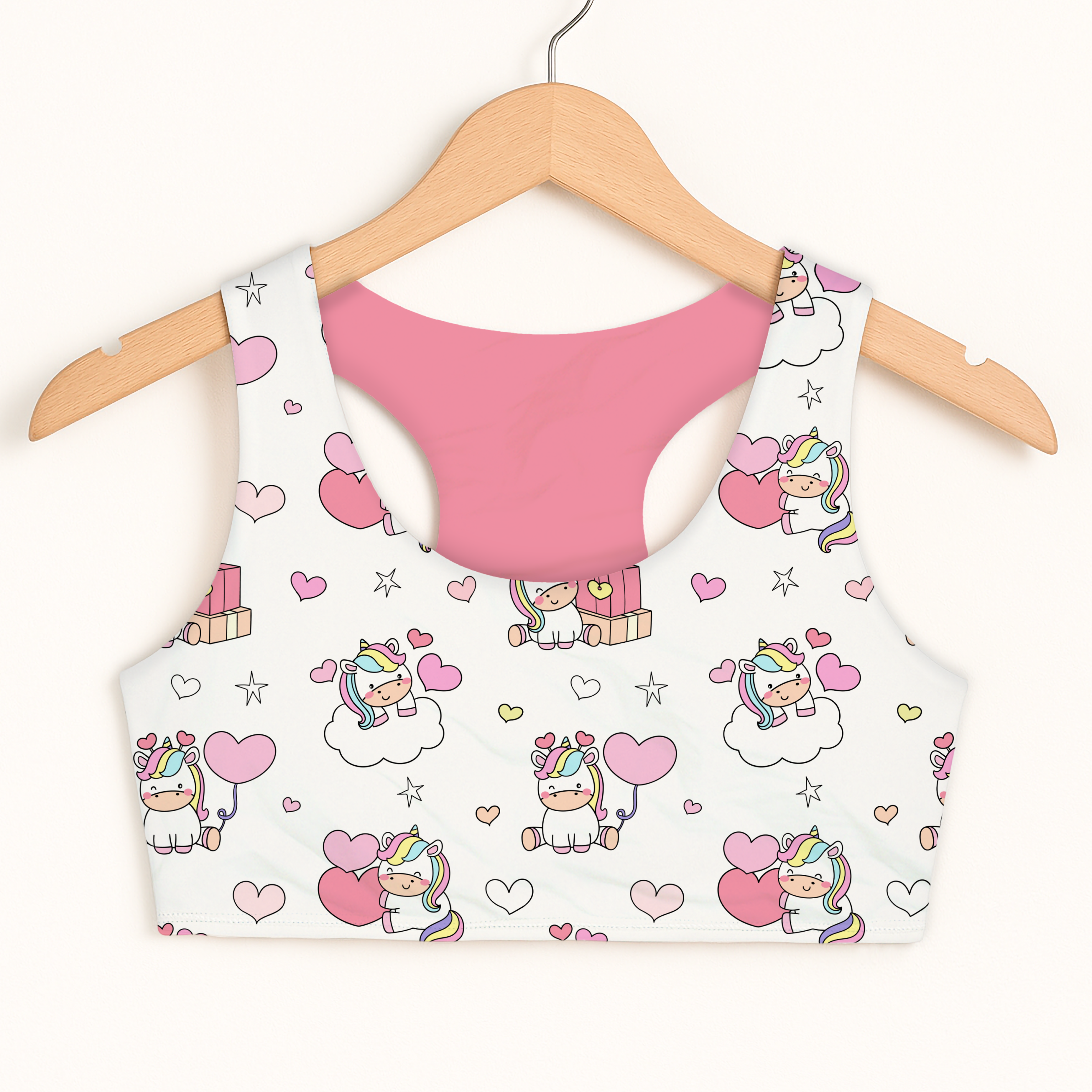 Girls unicorn birthday sports bra white cropped tank top with pink interior and cartoon unicorns holding hearts balloons