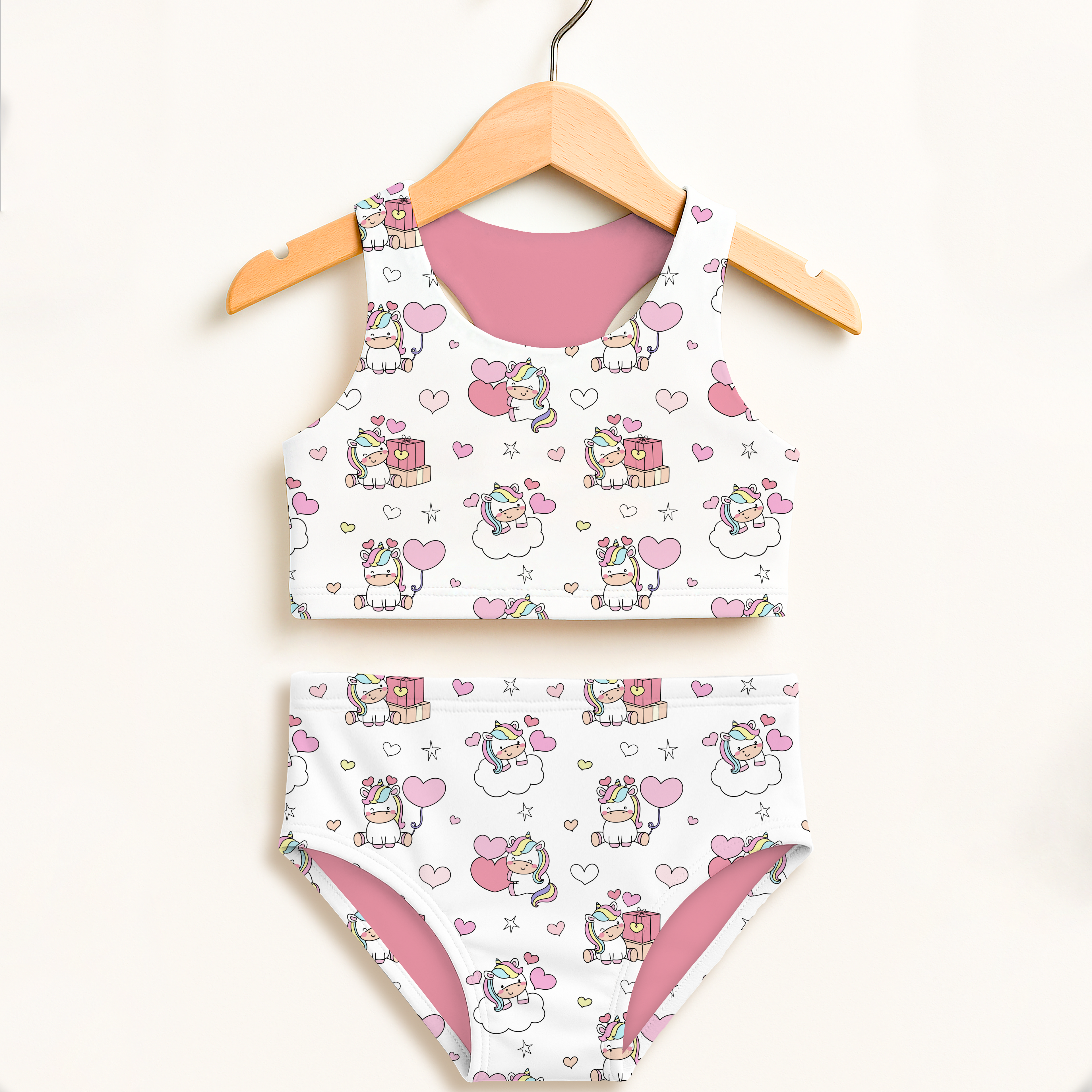 Girls unicorn birthday two piece swimsuit in white and pink with cartoon unicorns hearts gifts pattern and upf 50+ protection