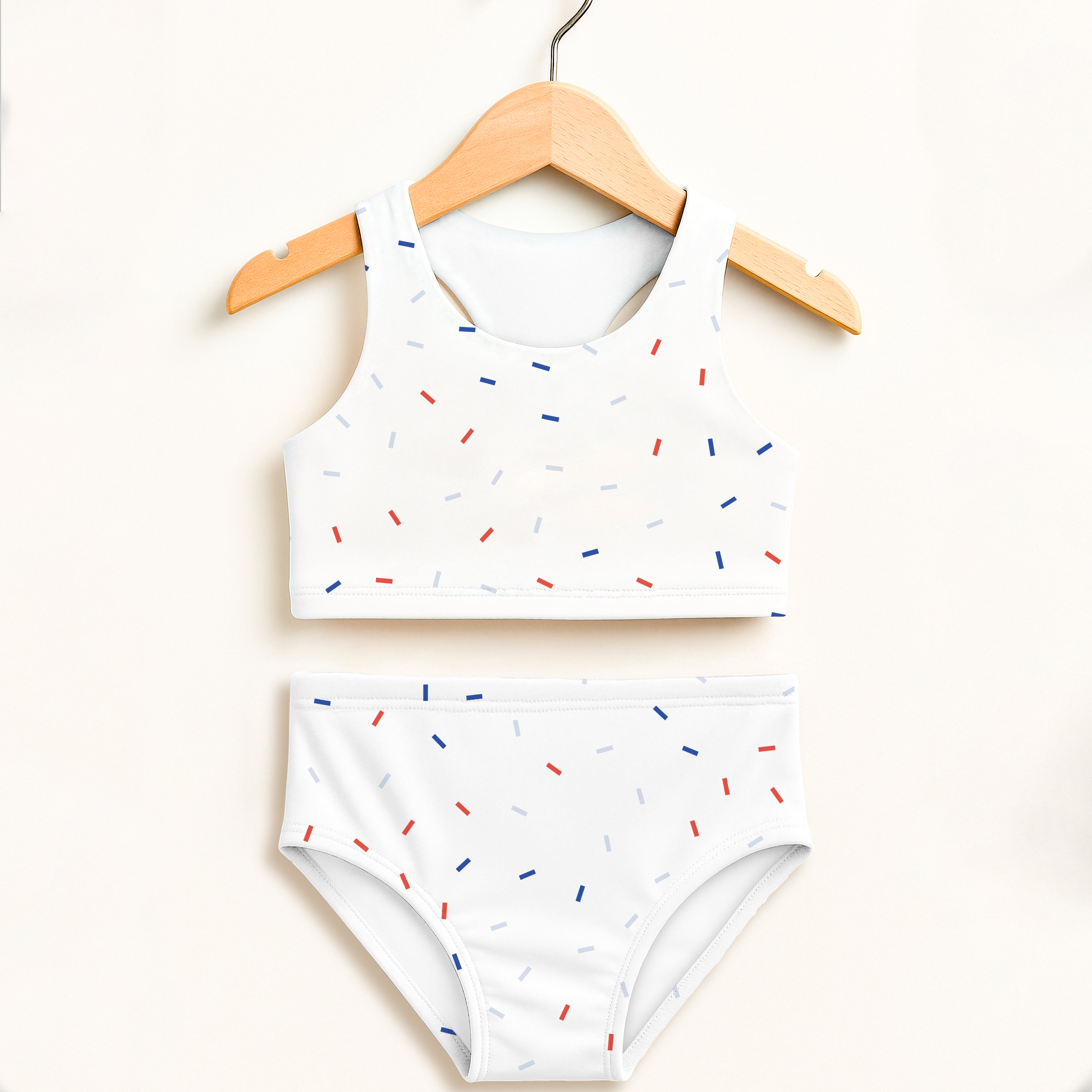 White girls confetti sprinkles two piece bikini set with red blue gray sprinkle pattern and upf 50+ high waisted design