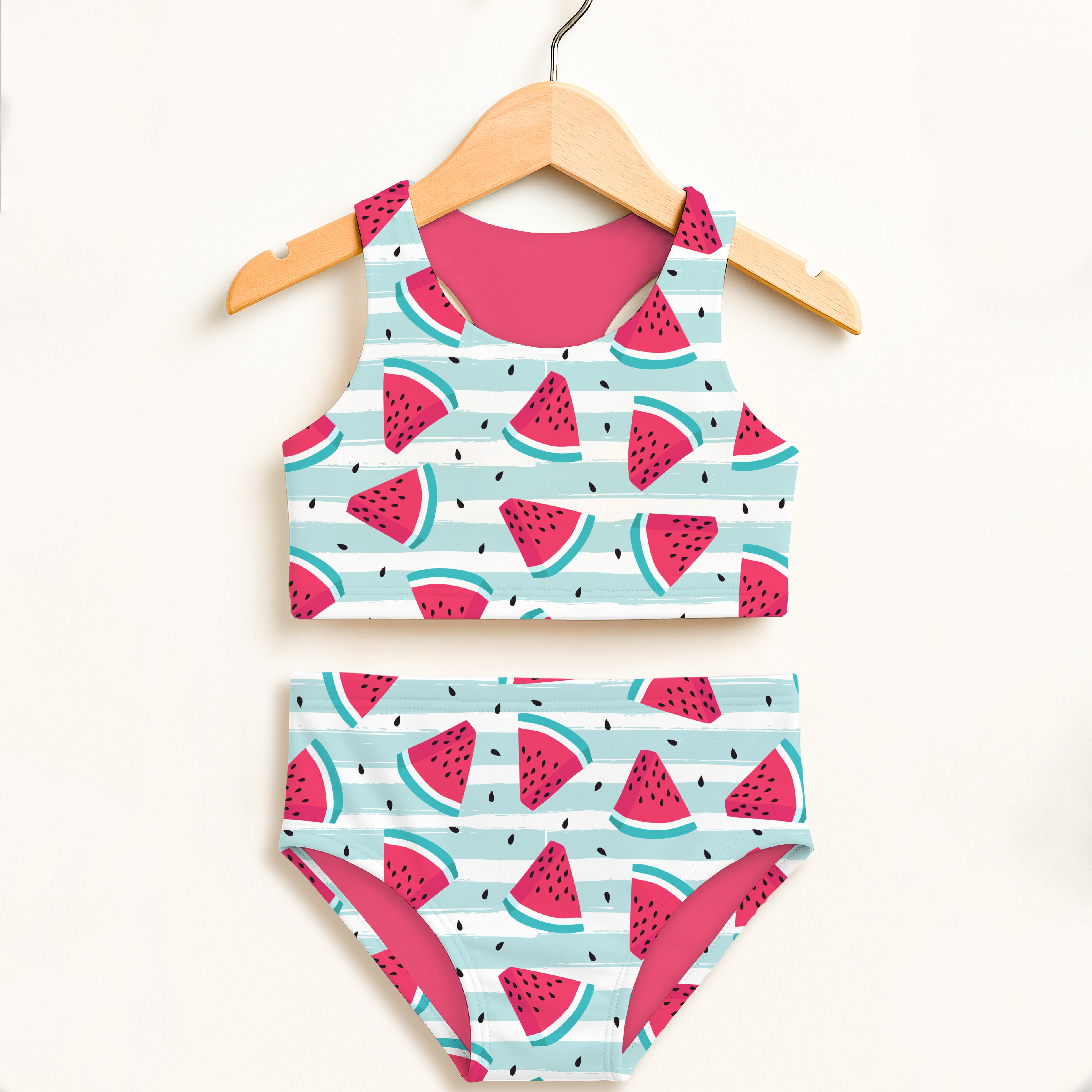 Girls watermelon stripe two-piece swimsuit with light blue and white stripes pink lining and red watermelon print