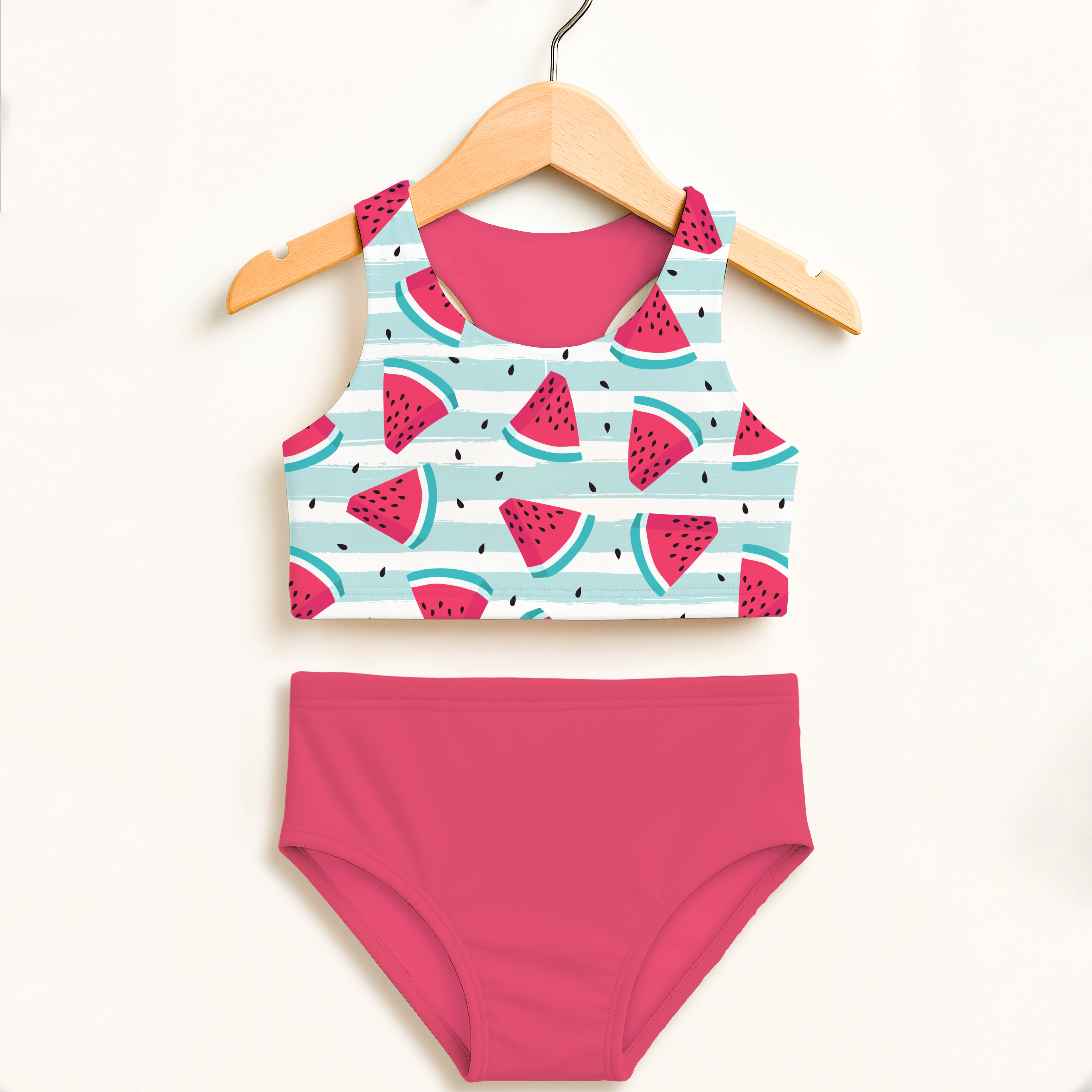 Girls red watermelon stripe two piece swimsuit with striped top and solid pink high waisted bottoms with upf 50+ protection