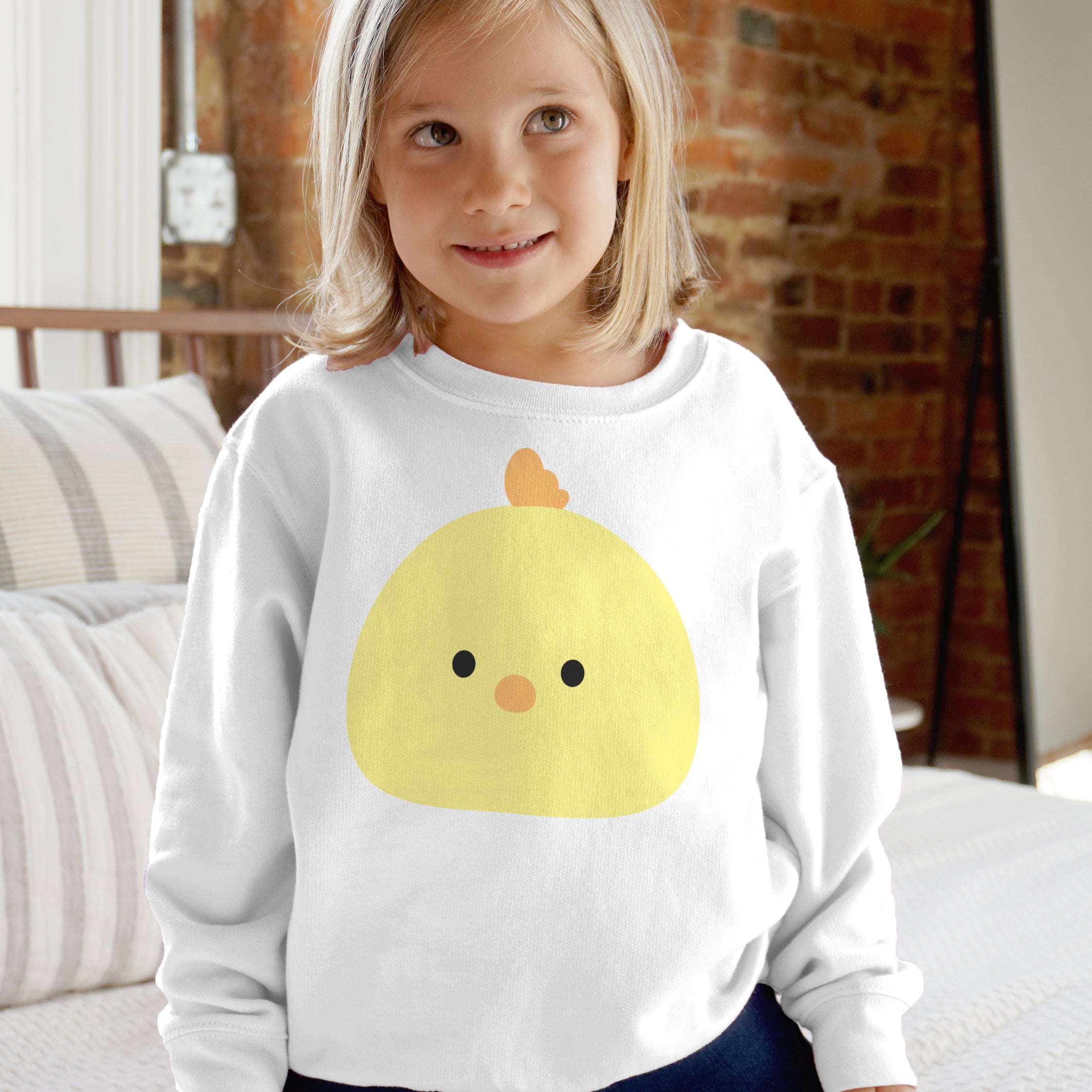 White long-sleeved sweatshirt with cheerful yellow chick graphic for kids cute farm animal pullover for boys and girls