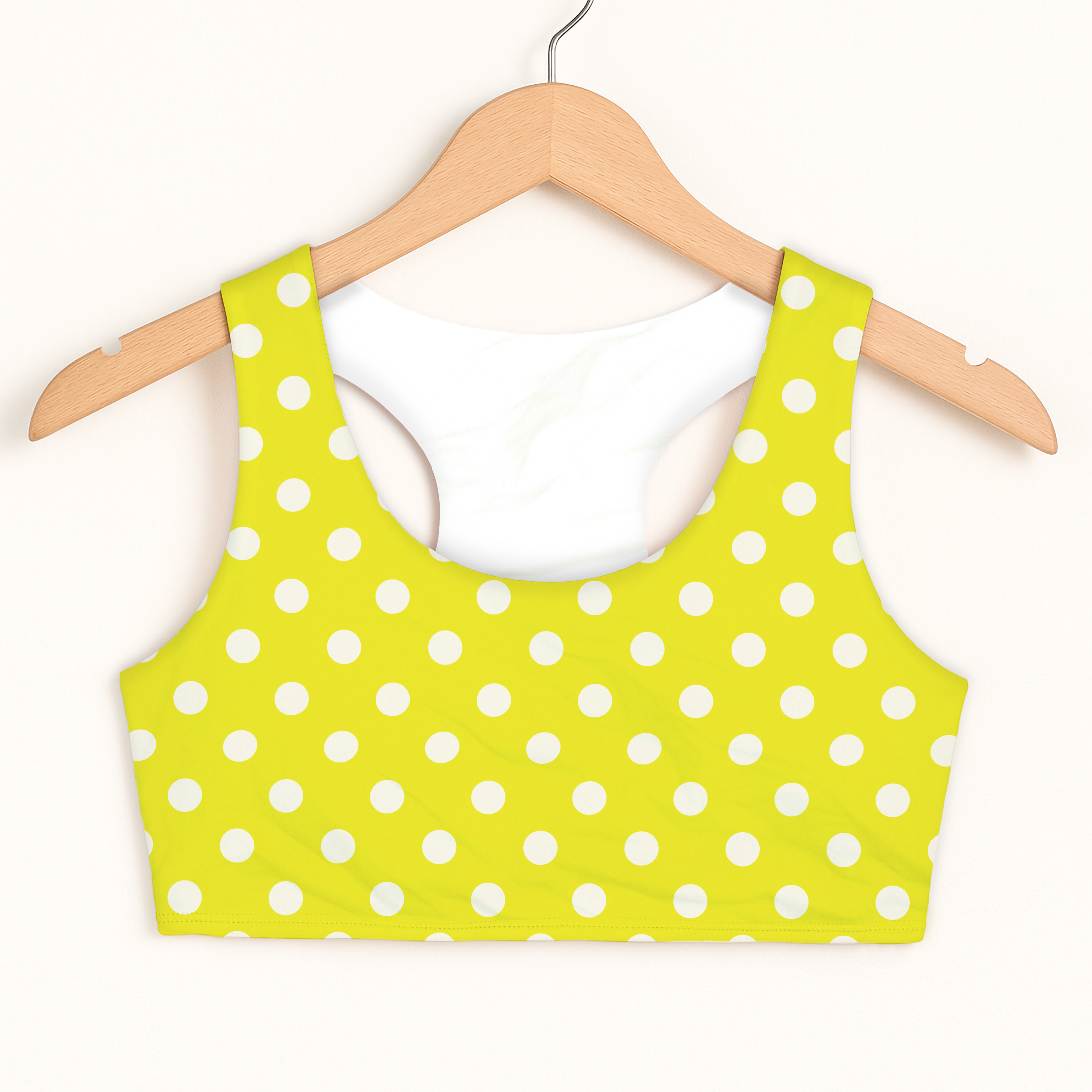 Girls yellow polka dots sports bra in bright lime green with white dots racerback quick drying double layered comfort